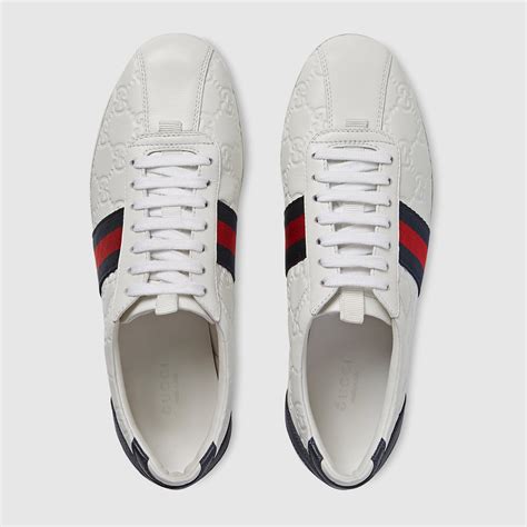 gucci guccissima leather lace-up sneaker|Gucci designer low top sneakers.